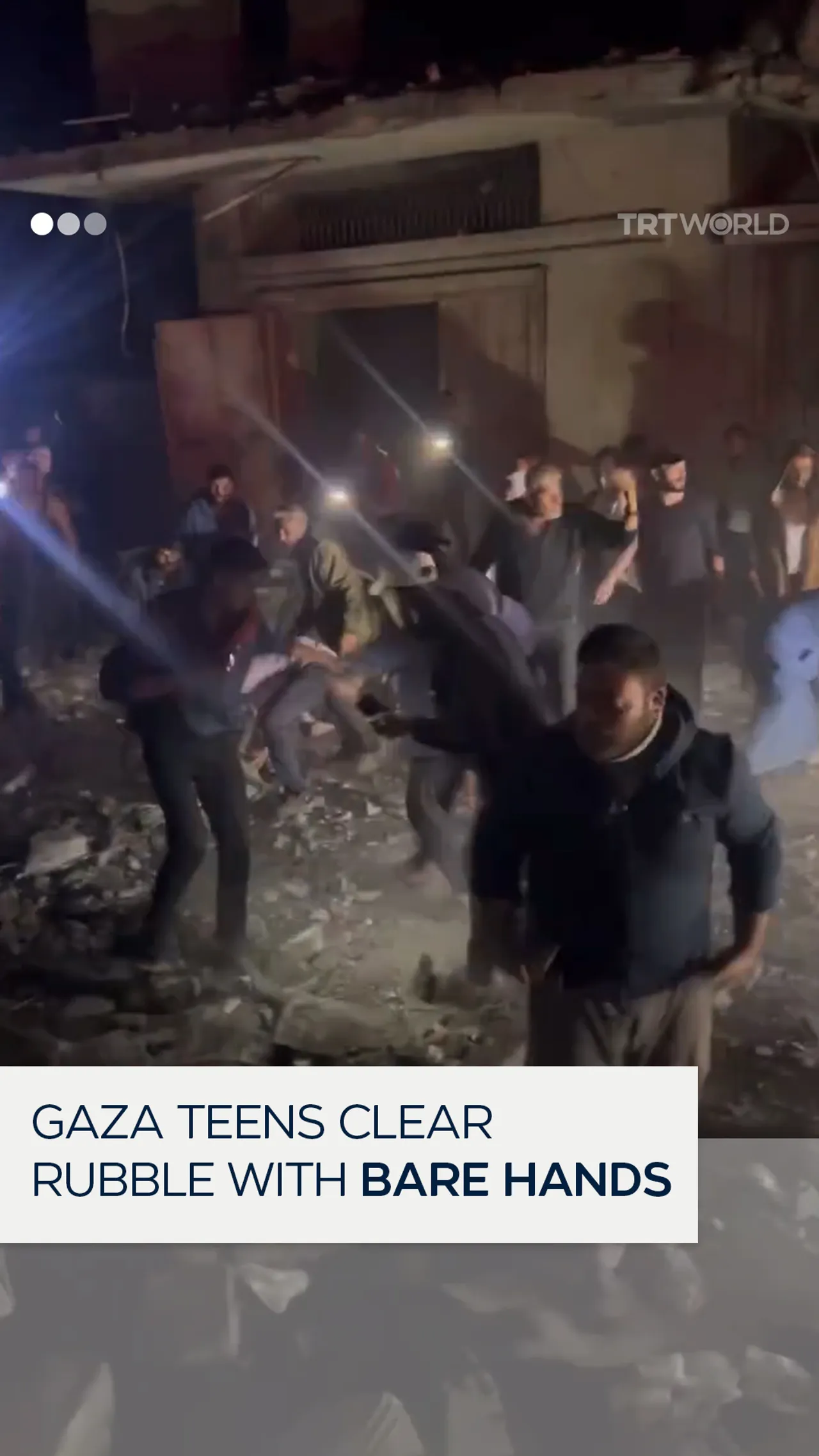 Gaza teens remove rubble by hand to help civil defence vehicles pass